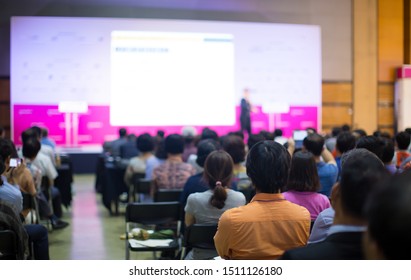 Conference Photo Audience And Speakers Giving Speech. Seminar Presenters On A Panel During Forum. Corporate Managers In Sales Executive Training Discussion On Stage. Investor Pitch Presentation.
