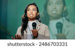 Conference, presentation or seminar and public speaking woman with microphone on stage for development speech. Business, podium and tradeshow with Indian motivational speaker in corporate auditorium