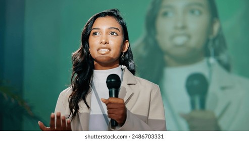 Conference, presentation or seminar and public speaking woman with microphone on stage for development speech. Business, podium and tradeshow with Indian motivational speaker in corporate auditorium - Powered by Shutterstock