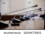 Conference room or seminar meeting room in business event. Session of Government. Academic classroom training course in lecture hall. blur abstract background. working in modern bright office indoor