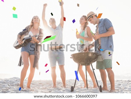 Confetti against millennials at beach party