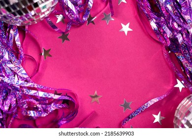 Confetti, And Mini Disco Balls On A Christmas Or New Year Party Background With Empty Space For Greeting Text.