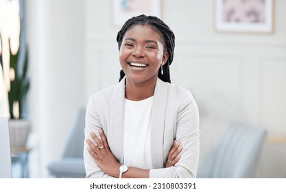 Confidence, crossed arms and portrait of a businesswoman in the office with leadership and success. Happy, smile and professional African female corporate ceo standing with vision in her workplace. - Powered by Shutterstock