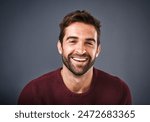 Confidence, face and smile of man in studio, sweater and warm for winter in Canada, happy and discount. Gray background, portrait and joy of person, sale and cardigan of cotton, clothes and jersey