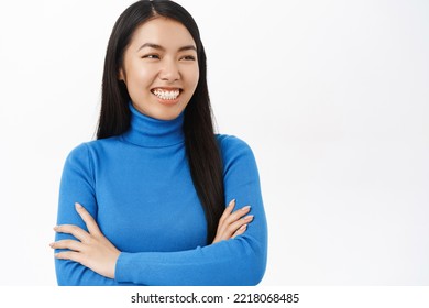 Confidence. Smiling Young Asian Woman In Power Pose, Cross Arms On Chest With Confident Face, Self-assured Look, Stands Over White Background