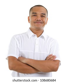 Confident 30s Southeast Asian man crossed arms isolated on white background