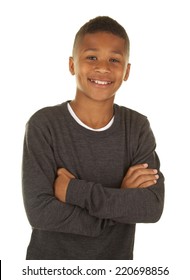 Confident African American Boy With His Arms Folded On A White Background