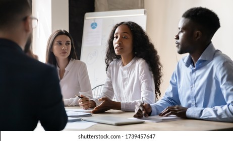 Confident African American Businesswoman Speaking At Corporate Meeting In Boardroom, Sharing Startup Ideas, Serious Female Coach Mentor Training Teaching Staff, Team Leader Giving Instructions