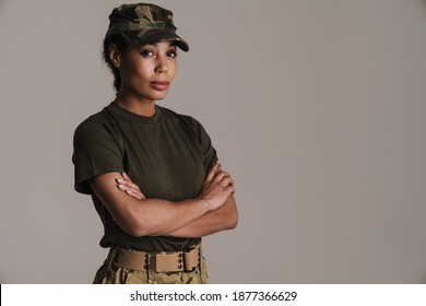 Confident African American Soldier Woman Posing With Arms Crossed Isolated Over Grey Wall