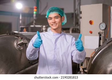 Confident Asian man employee working in food Factory industry , Asia Worker work in food factory - Shutterstock ID 2190281813