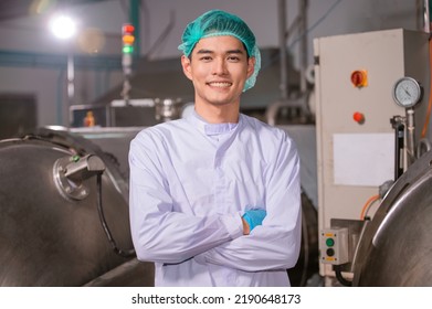 Confident Asian Man Employee Working In Food Factory Industry , Asia Worker Work In Food Factory