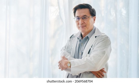 confident asian senior male doctor isolated. - Powered by Shutterstock