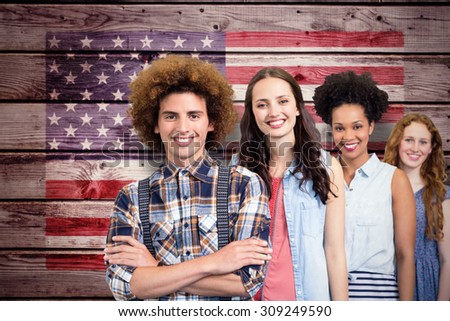 Confident and attractive fashion designers against composite image of usa national flag