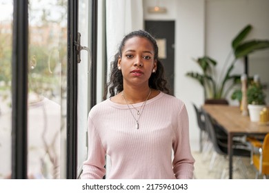 Confident beautiful African woman professional with serious face standing at home in office looking at camera. Confident entrepreneur lady posing alone, head shot close up view portrait - Shutterstock ID 2175961043