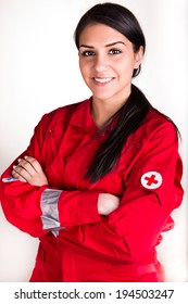 Confident Beautiful Paramedic Woman In Uniform With Stethoscope On White Background