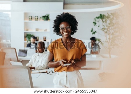 Similar – Image, Stock Photo Confident black woman in front of rustic stone backdrop