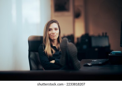 
Confident Bossy Manager with her Feet on the Desk. Unmotivated office employee with quiet quitting attitude
 - Shutterstock ID 2233818207