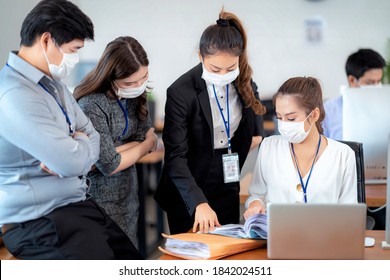 Confident business people with face mask protect from Coronavirus or COVID-19. Concept of help, support and collaboration together to overcome epidemic of Coronavirus or COVID-19 to reopen business.