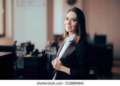Confident Business Woman Standing in the Office. Happy female manager showing self-confidence and charisma 
