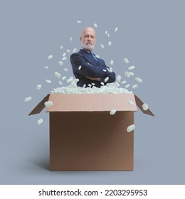 Confident Businessman Posing With Arms Crossed In A Delivery Box, New CEO Concept