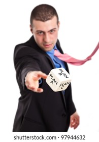 Confident Businessman Rolling A Dice