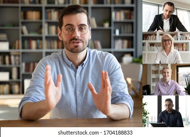 Confident businessman team leader lead group videoconference meeting with different age and ethnicity partners, diverse people negotiating distantly working from home, full frame pc screen webcam view