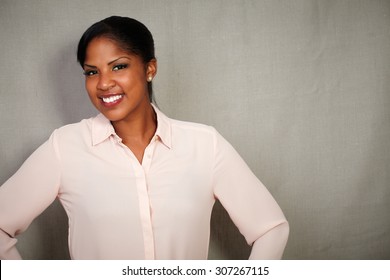 Confident Businesswoman In Button Down Shirt Looking At The Camera - Copy Space