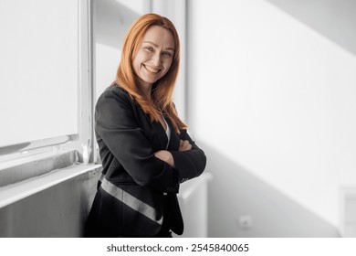 Confident Businesswoman in Sunlit Office - Powered by Shutterstock