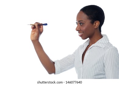 Confident Businesswoman Throwing Dart