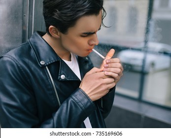confident casual cool man smoking. addiction bad habit youth lifestyle cancer concept