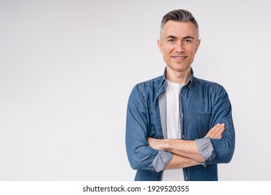 Confident Caucasian Middle-aged Man In Casual Clothes With His Arms Crossed Isolated Over White Background