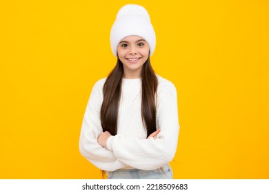 Confident Child Keep Arms Crossed, Isolated On Yellow Background, Empty Space. Little Caucasian Teenage Girl 12, 13, 14 Years Old Hold Hands Crossed. Children Studio Portrait. Childhood Lifestyle.