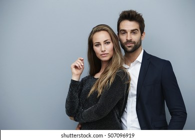 Confident Couple In Smart Clothing, Portrait