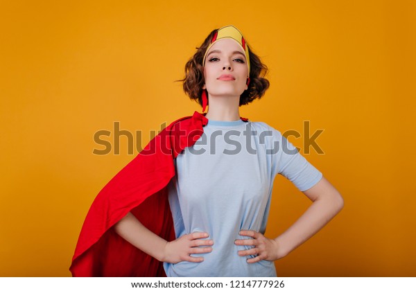 Confident Curly Girl Superhero Attire Posing Stock Photo Edit Now