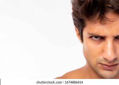 Confident Determined Handsome Young Guy Handsome Young Caucasian Man Looks At Camera. Male Get Angry, Mad Face. Closeup Half Face. He Has Strong Mind. Isolated On White Background, Copy Space