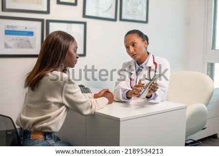 Similar – Image, Stock Photo African american women talking and laughing in the city