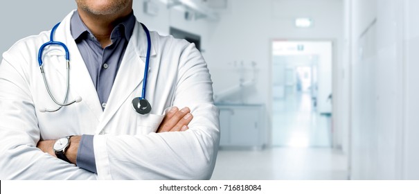 Confident doctor posing with arms crossed and stethoscope, medical advice and health insurance banner