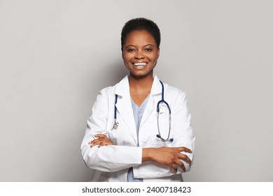 Confident female doctor medical worker on white background - Powered by Shutterstock