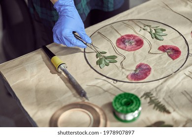 Confident Female Florist Is Working With Dryed Flowers In Cozy Flower Shop