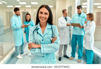 A confident female healthcare professional stands strong with a diverse medical team, emphasizing the importance of collaboration and professionalism in providing highquality patient care - Powered by Shutterstock