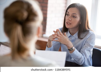 Confident Focused Businesswoman, Teacher Or Mentor Coach Speaking To Business People At Negotiations, Woman Leader Speaker Applicant Talking At Meeting Or Convincing Hr During Job Interview Concept