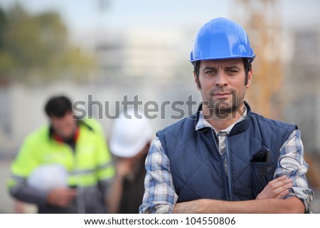 Confident foreman on construction site
