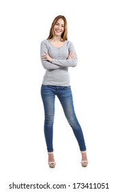 Confident Full Body Of A Casual Happy Woman Standing Wearing Jeans Isolated On A White Background              