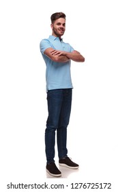 Confident Handsome Man Wearing A Blue Polo Shirt Standing On White Background, Full Length Picture