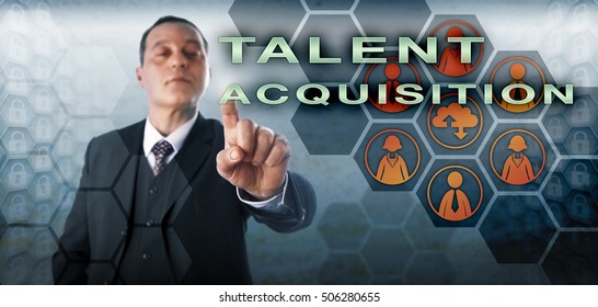 Confident Human Resources Manager Is Picking TALENT ACQUISITION Onscreen. Business Concept And Technology Metaphor For The Strategic Planning And Management Of Future Human Capital Requirements.