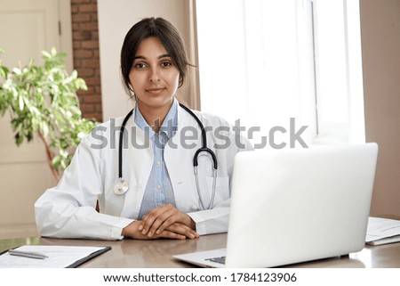 Similar – Image, Stock Photo Pretty female doctor in a geriatric clinic with elderly woman in wheelchair