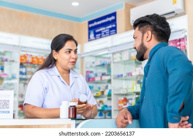 Confident Indian Woman Pharmacist Medication Recommendation Stock Photo ...