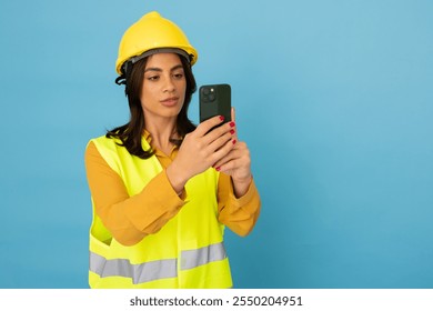 Confident Latina construction engineer with protective gear - Powered by Shutterstock