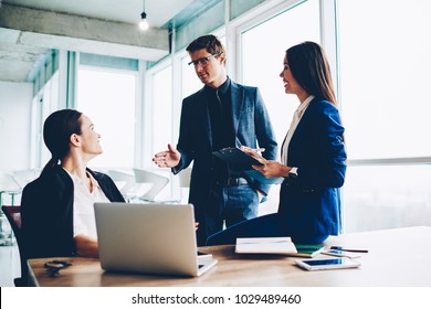 Confident Male Director Communicating With Employees Controlling Productivity Of Job And Talking About Tasks,crew Of Creative Female Managers Having Consultancy With Proud Ceo Sitting In Loft Office