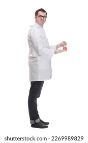 Confident man doctor wearing unifrom and glasses holding beaker - Shutterstock ID 2269989829
